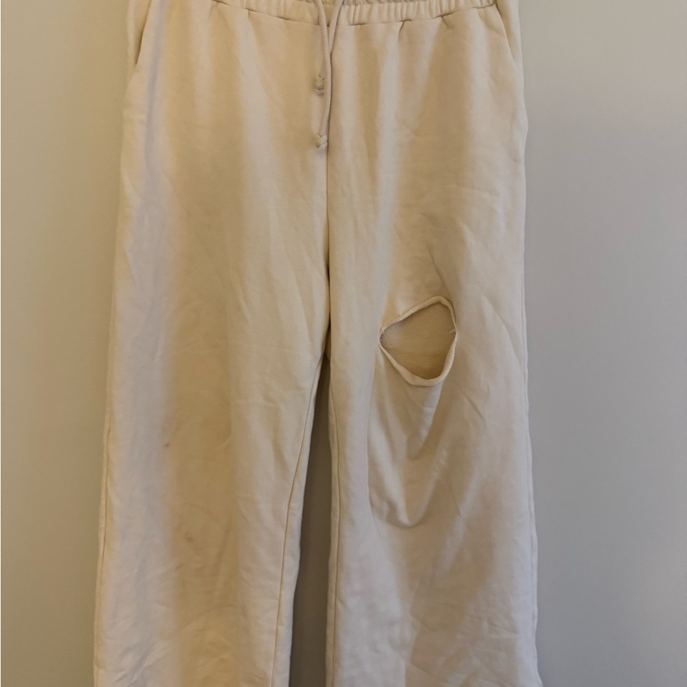 Cream Drawstring Pants with Distressed Detail